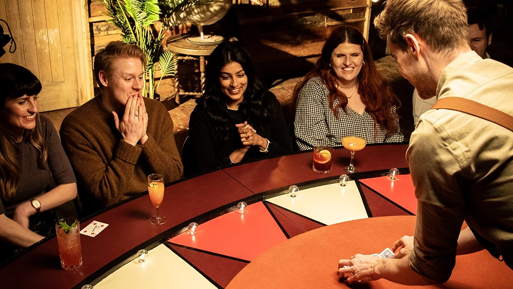 Audience members get up close and personal at The Magicians Table