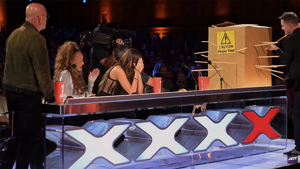 Young and Strange perform an illusion close up on America's Got Talent audition