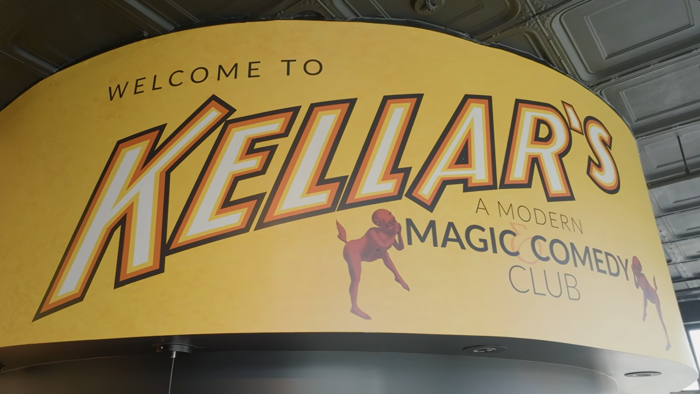 A sign featuring Kellar's signature imps welcomes guests.
